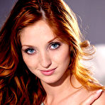 Pic of Red Fox stunning redhead fondling her sweet pussy on the couch