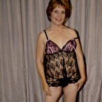 Pic of Mommy gets fisted by a naughty mature nurse