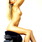 Pic of Diana - Attractive blonde gal Diana strips for the camera and shows her tight round ass.