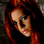 Pic of Gabrielle Lupin - Smoking hot redhead babe Gabrielle Lupin takes off her shirt and exposes her rack.