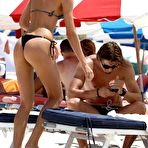 Pic of Candice Swanepoel exposed her sexy ass in thongs on the beach
