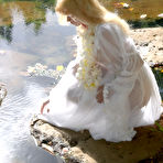 Pic of Jane A - Jane A takes her sexy white gown in front of the camera and shows her hot ass.