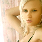 Pic of Lena L - Lena L takes her sexy black lingerie off on the bed and shows us her fantastic ass.