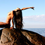 Pic of Lissa A - Lissa A strips all of her clothes outdoors by the ocean and shows her hot ass.