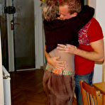 Pic of Horny housewife munching on a younger cock