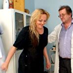 Pic of Nice older lady spreads her legs on gynochair during pussy checkup