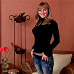 Pic of Girl-next-door posing in satin bra and sheer hose