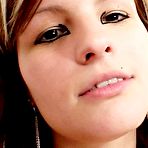 Pic of Julie  dressed in hose tights toys herself like crazy