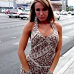 Pic of Milf tanned Christina displays her legs and pussy 