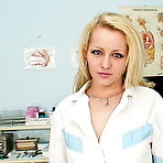 Pic of Eager nurse Rose using gyno tool to open her piss hole