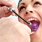 Pic of Pavlina forced by gyno professor to lick her bosom and open her cooter wide