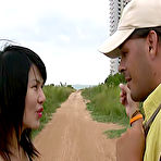 Pic of Naked shemale gal Gold showing her assets outdoors