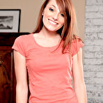 Pic of Tiffany Haze - Smoking hot redhead teen Tiffany Haze strips her mini skirt and shows her fanny.