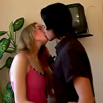 Pic of iTeenVideo - Tanned stunner exposing her well rounded ass in the kitchen