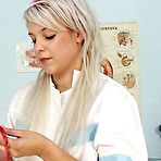 Pic of Attractive nurse Sabina  ith natural juggs spreading beaver on gynchair