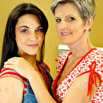 Pic of Hot babe having sex with a naughty mature lesbian