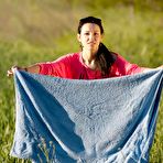 Pic of Endearing dark haired babe poses nude outdoors showing her soft boobs and her hairy pussy. - TheMetArt.com