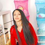 Pic of Alexis Love - Alexis Love takes her clothes off before the camera and shows her tight ass