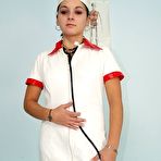 Pic of Nurse Nelia stretching cunt wide with a gyn mirror and sex toy masturbating