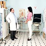 Pic of Agnes forced by gyno medic to lick her busts and open her puss wide