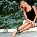 Pic of Violla A takes her sexy white dress outdoors and teases us with her round perfect boobs. - TheMetArt.com