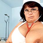 Pic of Fifty years old head nurse rubbing her pussy