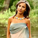 Pic of Big breasted Ekaterina C strips by the river in the woods and shows her perky round boobs. - TheMetArt.com