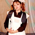 Pic of Девушка в костюме школьницы показывает свою голую пизду и жопу