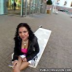 Pic of Public Inuasion Curly brunette chick sucks the head of a dick outdoor
