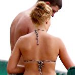 Pic of Margot Robbie wearing a bikini on a beach