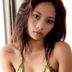 Pic of Gorgeous Filipina webcam girl strips out of a very skimpy bikini.