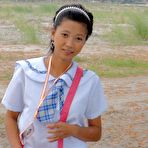 Pic of Filipina schoolgirl fucked outdoors in open field by tourist