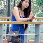 Pic of Sultry raven-haired Filipina tart in blue dress drains cum from foreign cock