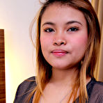 Pic of Busty Thai beauty deals with foreign cock