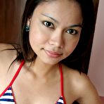 Pic of Asian Teen Strips Out Of String Bikini