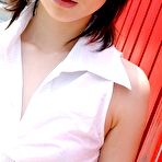 Pic of Japanese teen flashes her tiny tits at the camera and slowly strips out of her clothes to show that bare ass.