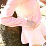 Pic of Naughty tramp in pink quickly flashes pussy