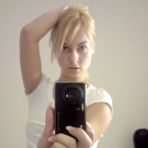 Pic of Very enthusiastic blonde girl does some nude selfies.
