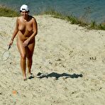 Pic of Smoothest nudists play together in the warm water