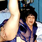 Pic of If you like big black mature girls with huge black boobs and round ebony butts then checkout Xotica. She loves to let her large black breasts hang down as she takes it from behind