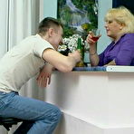 Pic of Lascivious mature chick treating sleepy guy like her sex toy for fucking