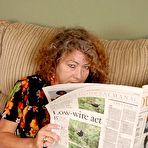 Pic of Chubby Loving - Mature Plumper Shows Pussy On Couch