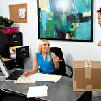 Pic of Hot and horny MILF secretary in sexy black stockings wants to have sex on her desk. at Naughty Office