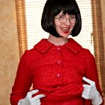 Pic of Fifties suit and nylons striptease performed by nasty mature teacher