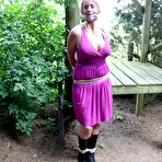Pic of Bondage Pictures - DeeDee pole-tied cleavegagged outside