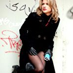 Pic of German girl in sexy black pantyhose and boots piss on the street at Nylon X-Files