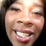 Pic of Ebony mature slut sucking on a white cock