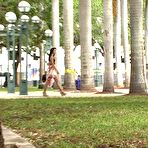 Pic of  Natalie Heart, the hot long legged beauty he's been following all day, has a flowy dress on. And it's windy. @ PantyhoseAddict