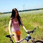Pic of Sexy biking nude teenager masturbates in the soft grass @ Ideal Teens Gallery