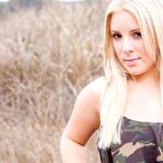 Pic of Busty Blonde Marilyn naked on a swing.